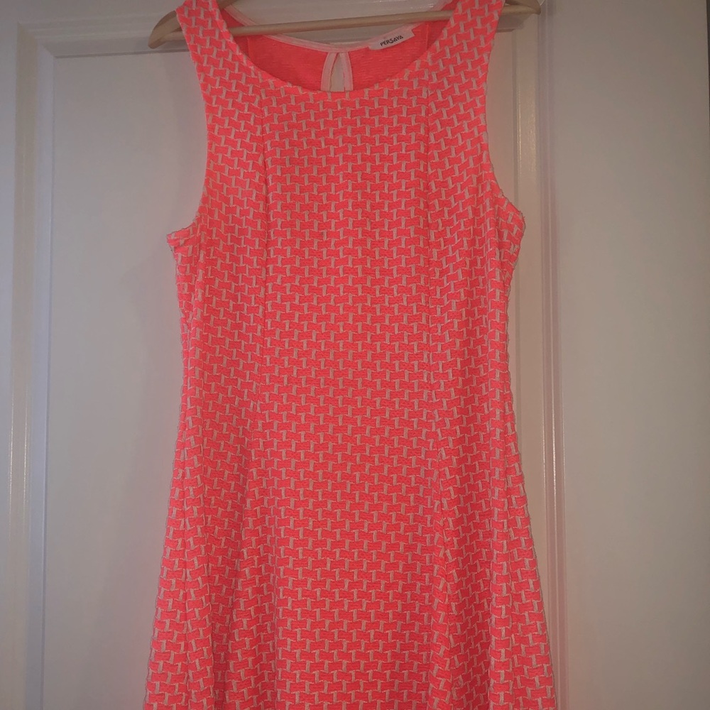 Persaya says size 8 orange and white dress